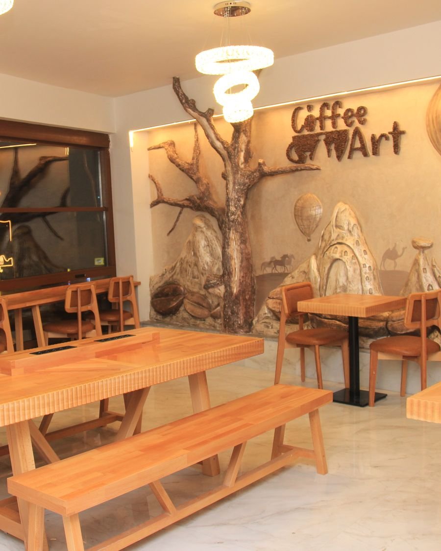 Kapadokya duvar resmi ve Coffee Art logosuyla salonumuz